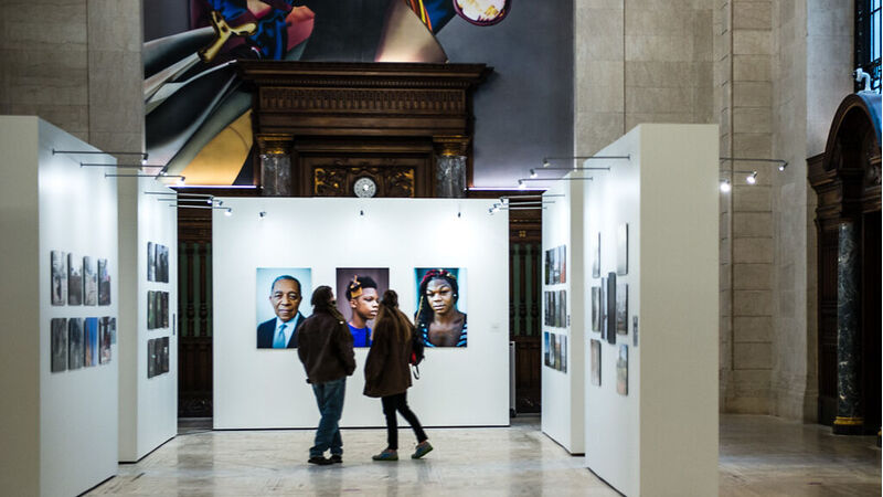 People exploring gallery